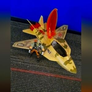 Camouflage Toy Jet with action figure Orange Canopy vintage 2010